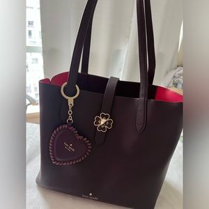 Kate spade Kaci tote in chocolate cherry. Free charm included.